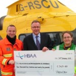 HBAA Chairman cheques out the year with donation to Warwickshire & Northamptonshire Air Ambulance